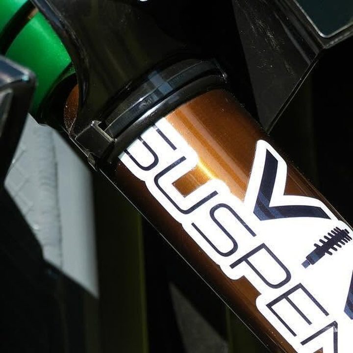 Close-up of a fork with a VIVA Suspension decal